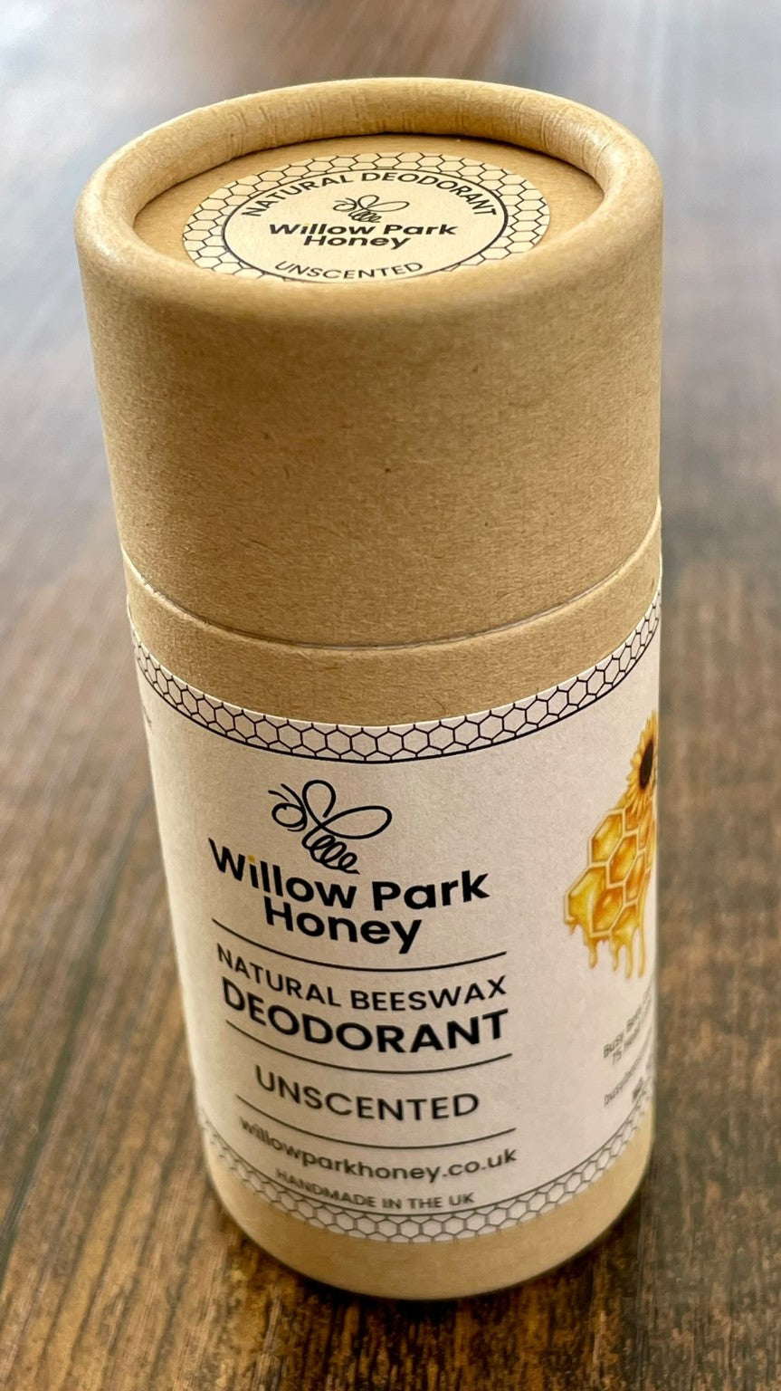 Unscented natural beeswax deodorant by Willow Park Honey in a cardboard tube